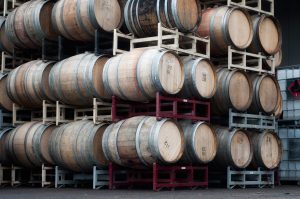 Stacks of empty wine barrels outside of Laurel Ridge Winery
